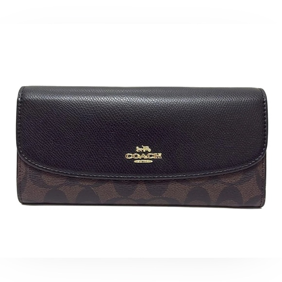 Coach Handbags - COACH Peyton Signature Slim Envelope Model
F54022 EUC